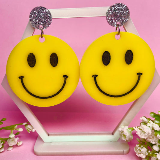 Acrylic smiley face statement earrings