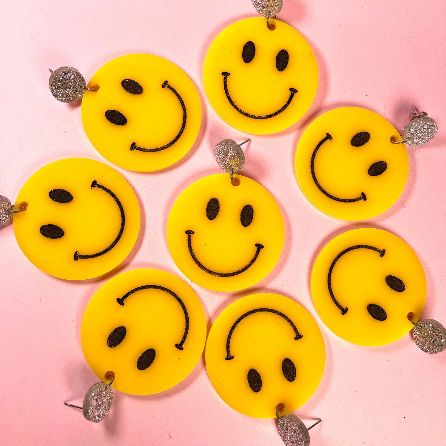 Acrylic smiley face statement earrings