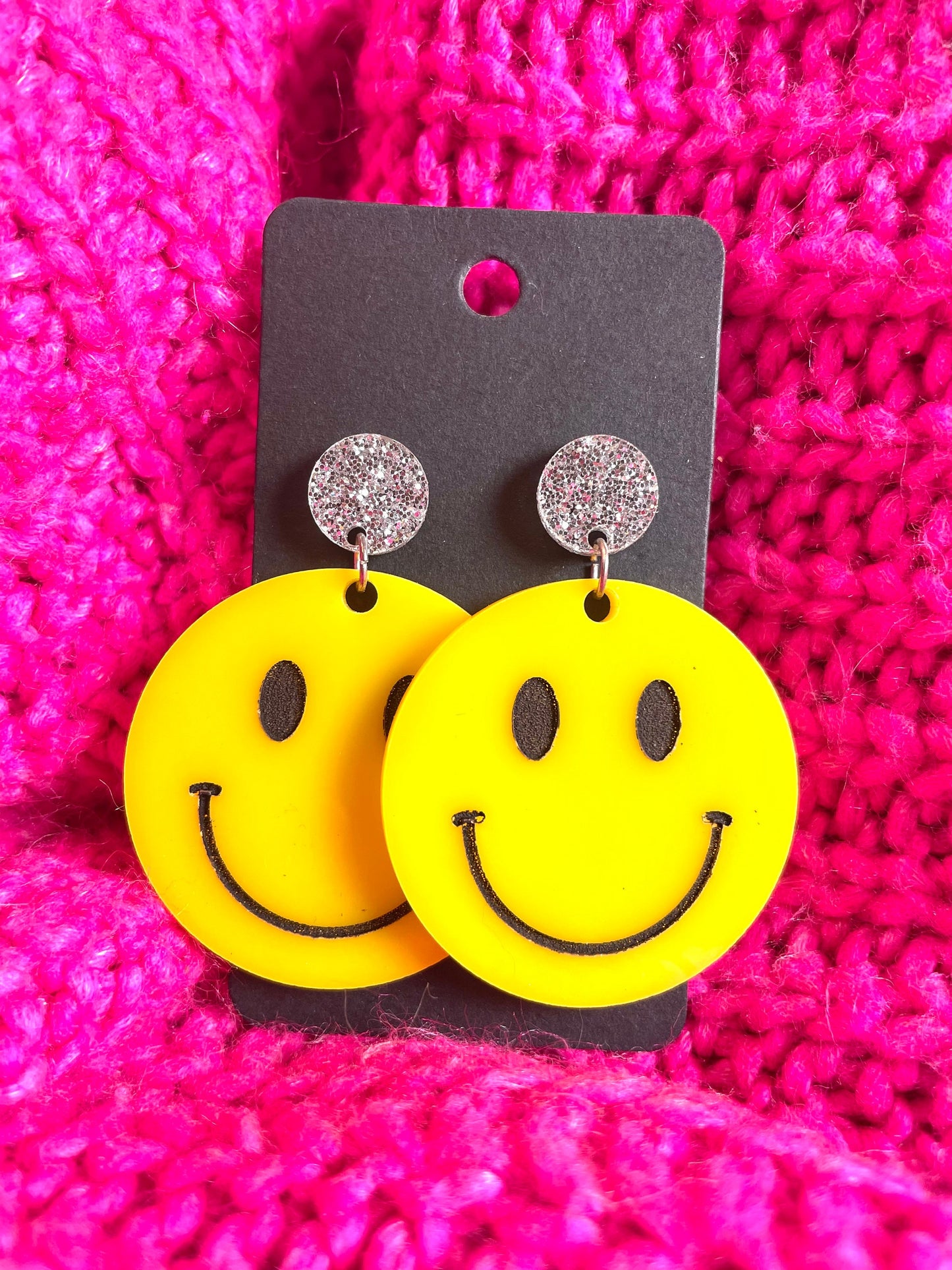 Acrylic smiley face statement earrings