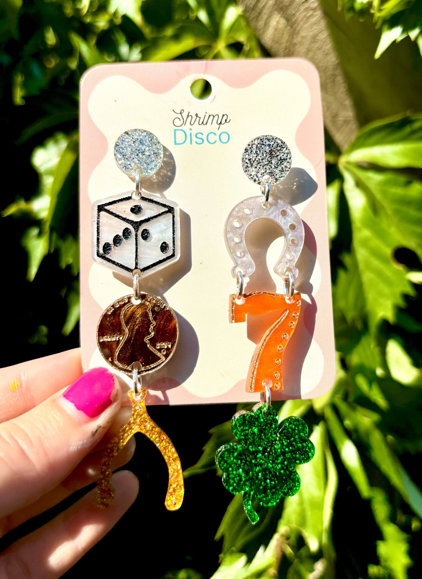 Good luck charm mismatched glitter statement earrings