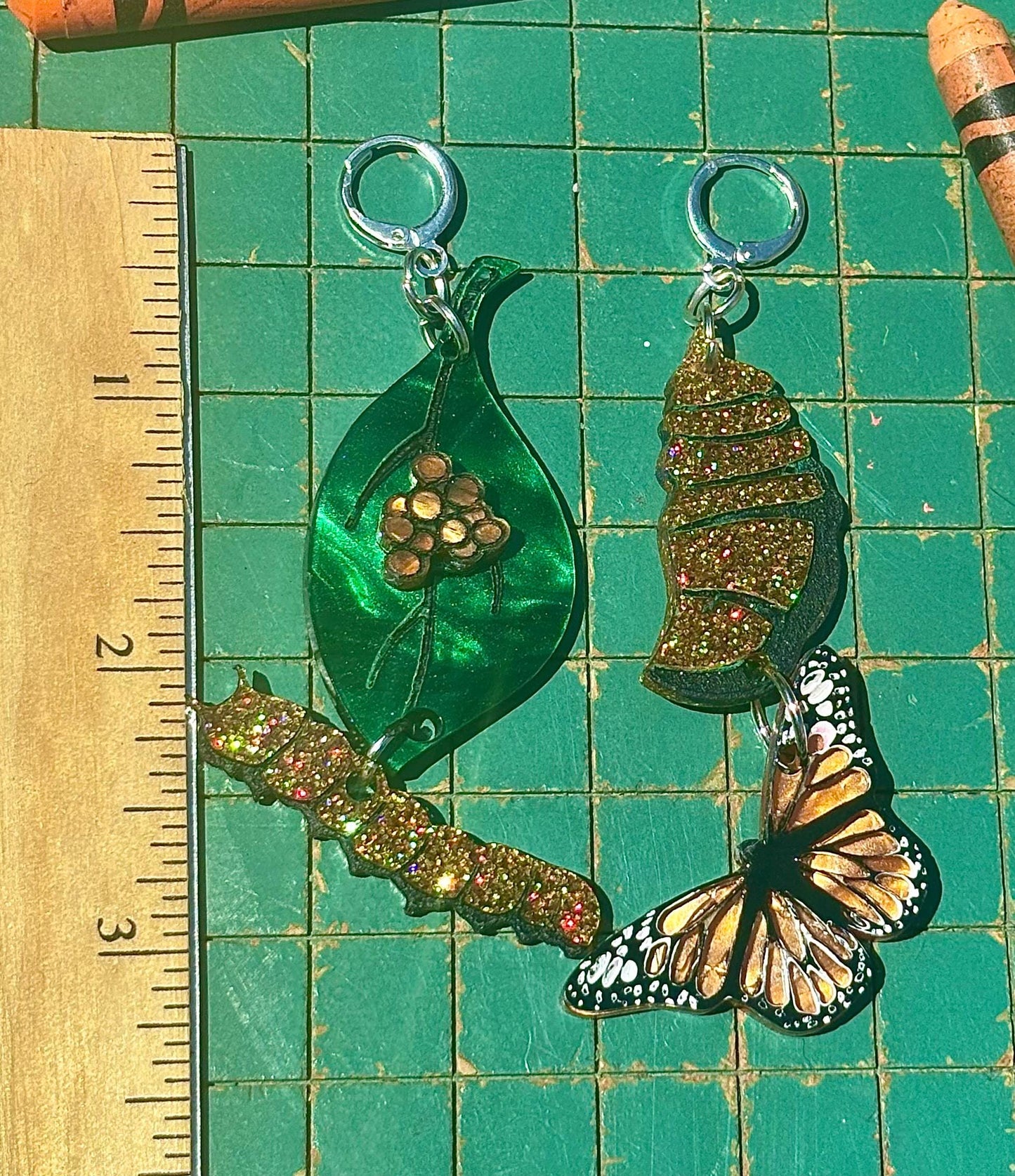 Mismatched butterfly life cycle phases acrylic earrings